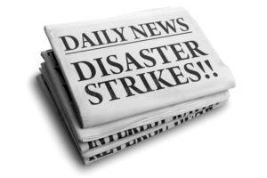 newspaper headline of disaster